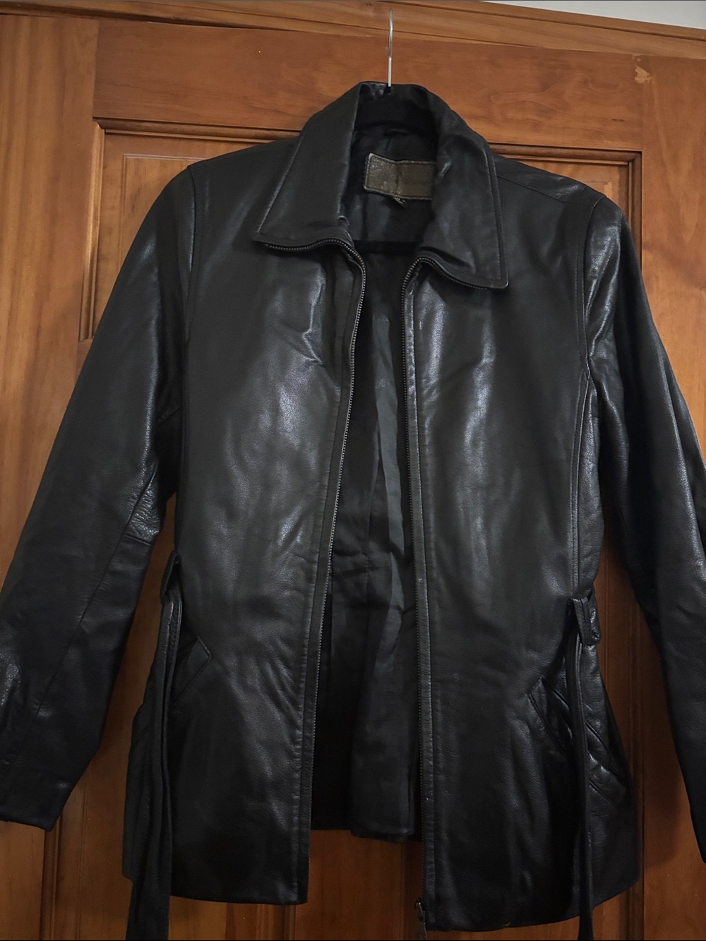 Black Leather Zip-Front Women’s Jacket with Side Tie Detail